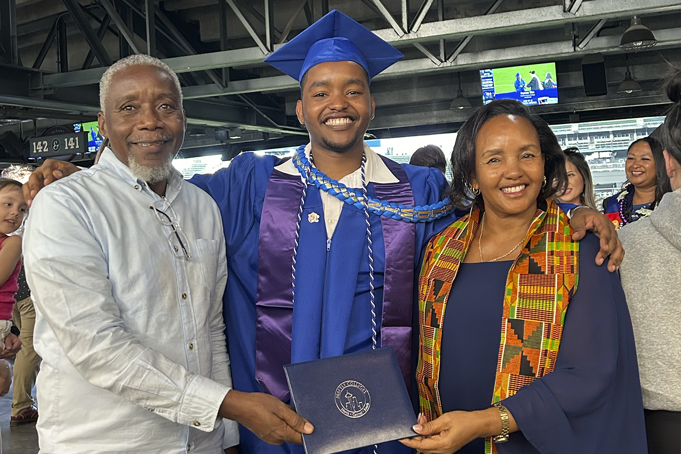 Telvin Kameta and his parents at Commencement 2024 